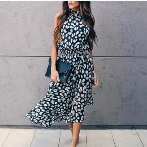 NWOT Elegant Smocked Black and White Leopard Print Dress